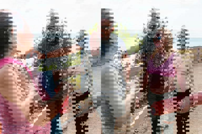 Sunrise Yoga Classes Draw Early Crowds to Sandbanks Beachfront Each Weekend